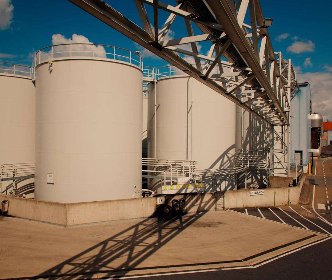 Chemical plant with industrial pipelines and storage tanks